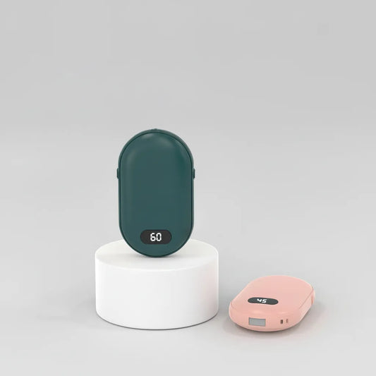 Green and Pink portable rechargeable hand warmer with single-sided heat, compact handheld warmer designed for everyday winter comfort